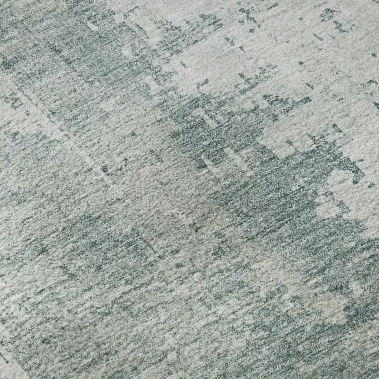 Turquoise And Ivory Abstract Washable Area Rug With UV Protection Photo 1