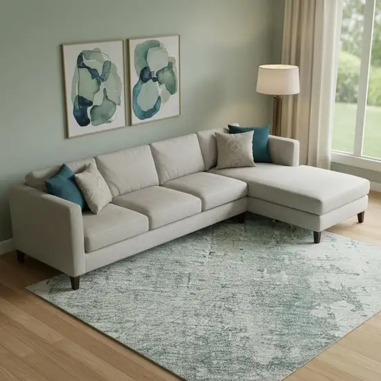 Turquoise And Ivory Abstract Washable Area Rug With UV Protection Photo 2