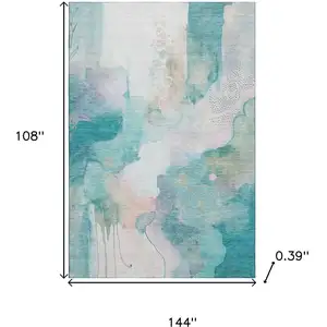 Photo of Turquoise And Ivory Abstract Washable Area Rug With UV Protection