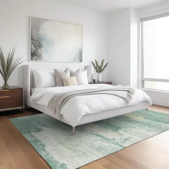 Turquoise And Ivory Abstract Washable Indoor Outdoor Area Rug Photo 6