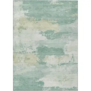 Photo of Turquoise And Ivory Abstract Washable Indoor Outdoor Area Rug