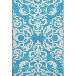 Photo of Turquoise And Ivory Damask Washable Area Rug With UV Protection