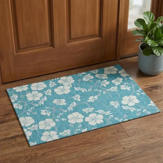 Turquoise And Ivory Floral Washable Area Rug With UV Protection Photo 1