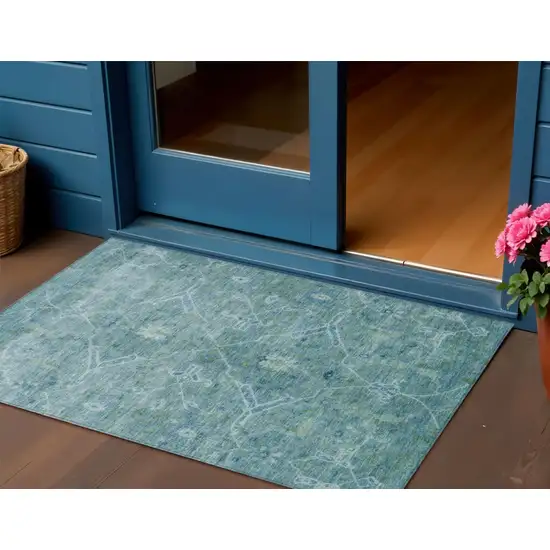 Turquoise And Ivory Floral Washable Indoor Outdoor Area Rug Photo 1