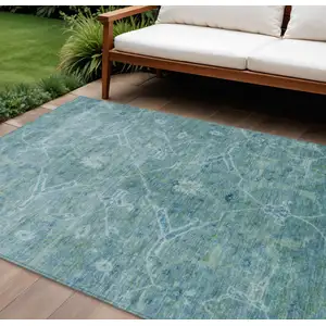 Photo of Turquoise And Ivory Floral Washable Indoor Outdoor Area Rug