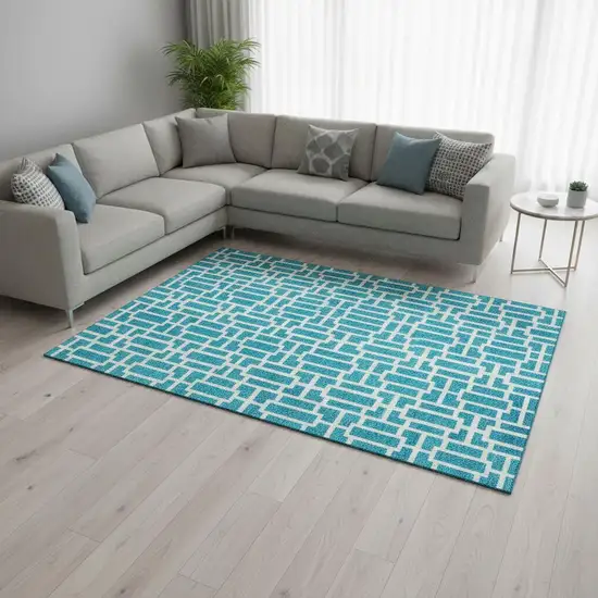 Turquoise And Ivory Geometric Washable Area Rug With UV Protection Photo 2