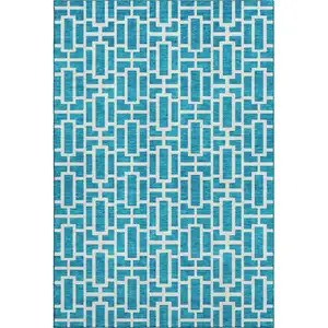 Photo of Turquoise And Ivory Geometric Washable Area Rug With UV Protection