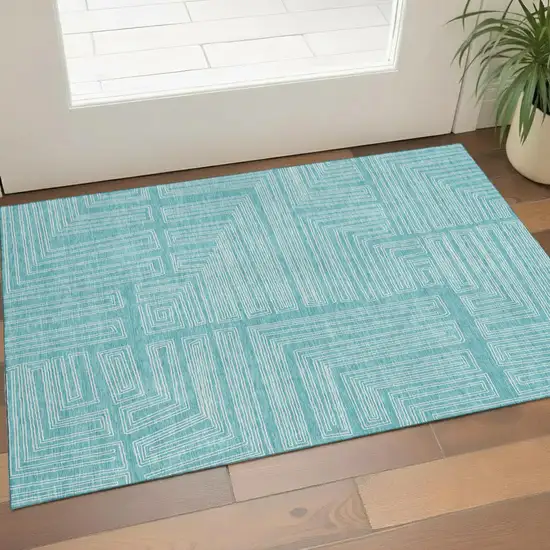 Turquoise And Ivory Geometric Washable Area Rug With UV Protection Photo 1