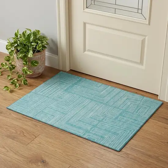 Turquoise And Ivory Geometric Washable Area Rug With UV Protection Photo 1