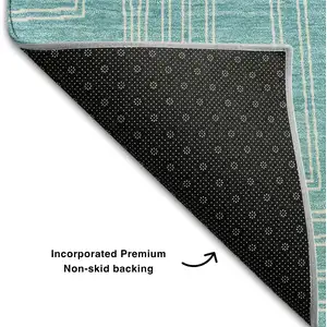 Photo of Turquoise And Ivory Geometric Washable Area Rug With UV Protection