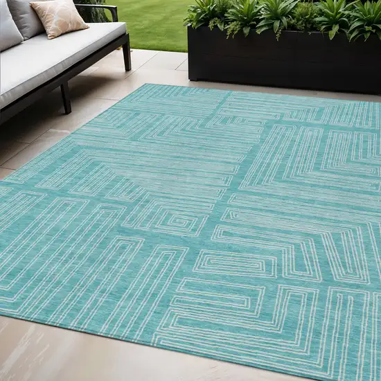 Turquoise And Ivory Geometric Washable Indoor Outdoor Area Rug Photo 1