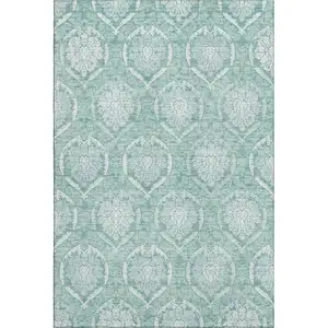 Photo of Turquoise And Ivory Medallion Washable Area Rug With UV Protection