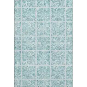 Photo of Turquoise And Ivory Medallion Washable Area Rug With UV Protection