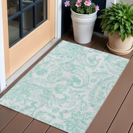Turquoise And Ivory Paisley Washable Indoor Outdoor Area Rug Photo 1