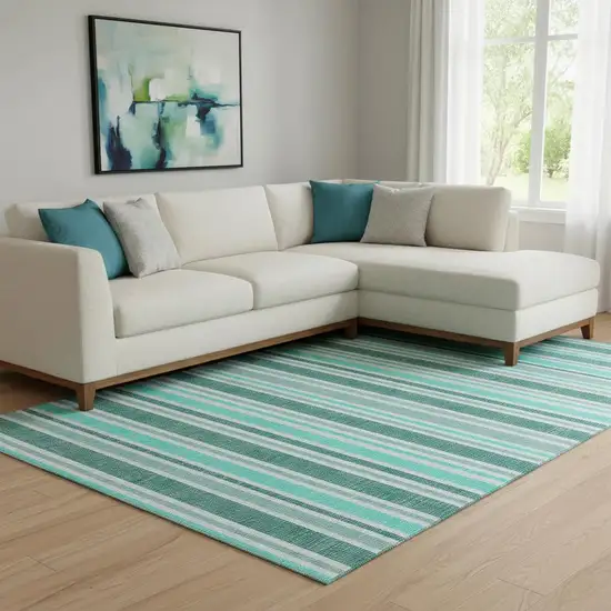 Turquoise And Ivory Striped Washable Area Rug With UV Protection Photo 1