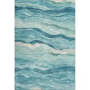 Photo of Turquoise And Ivory Striped Washable Area Rug With UV Protection