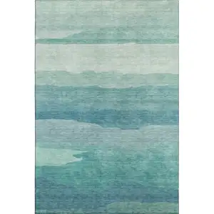 Photo of Turquoise And Ivory Striped Washable Area Rug With UV Protection