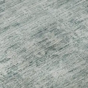 Photo of Turquoise And Ivory Striped Washable Area Rug With UV Protection