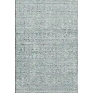 Photo of Turquoise And Ivory Striped Washable Area Rug With UV Protection
