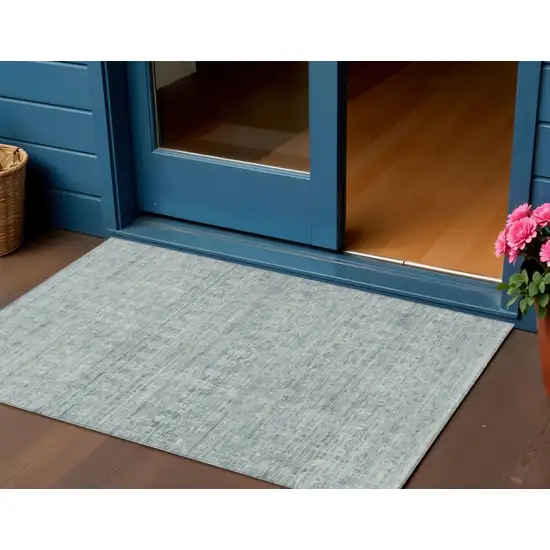 Turquoise And Ivory Striped Washable Indoor Outdoor Area Rug Photo 2