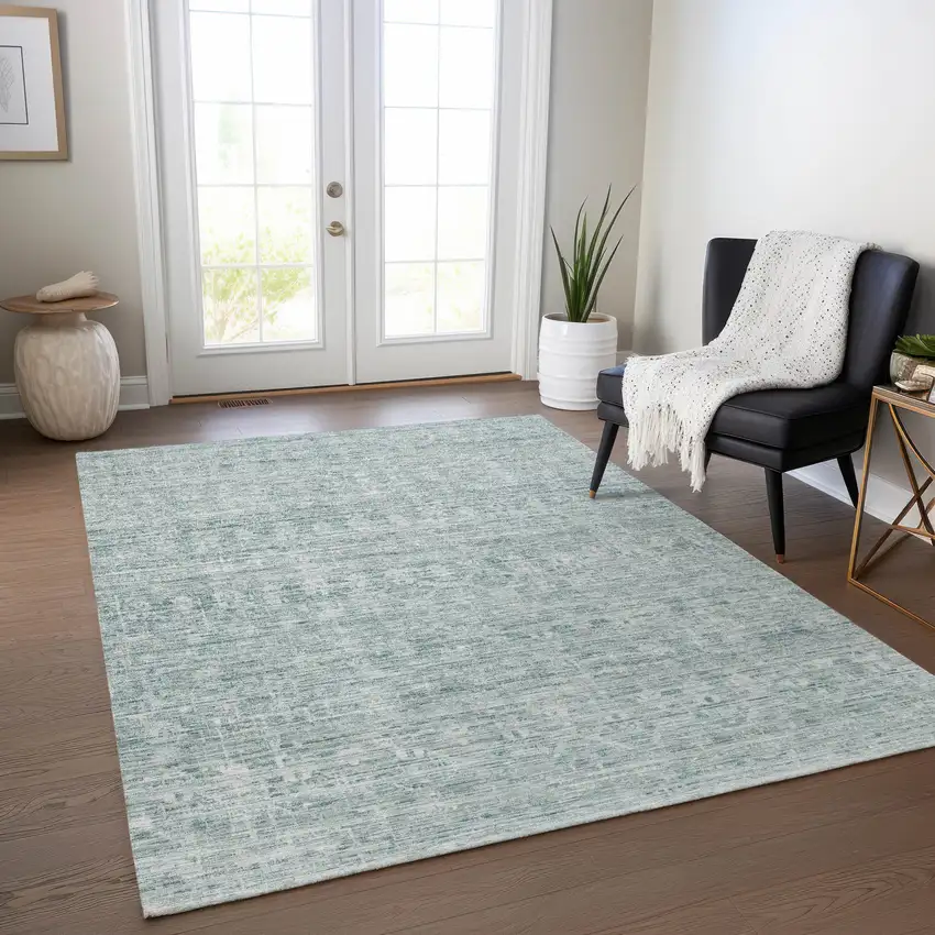 Turquoise And Ivory Striped Washable Indoor Outdoor Area Rug Photo 6