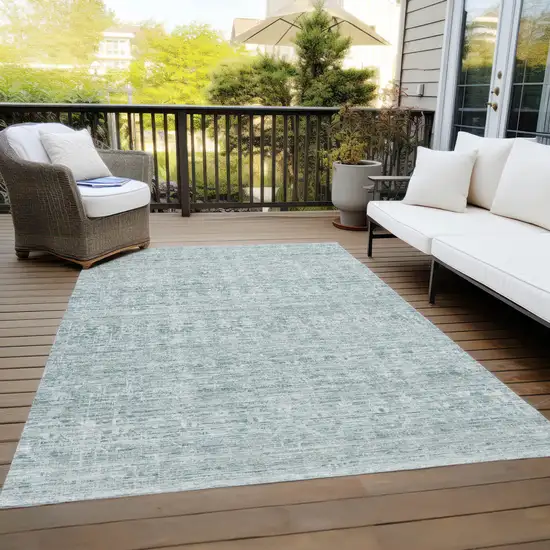 Turquoise And Ivory Striped Washable Indoor Outdoor Area Rug Photo 8