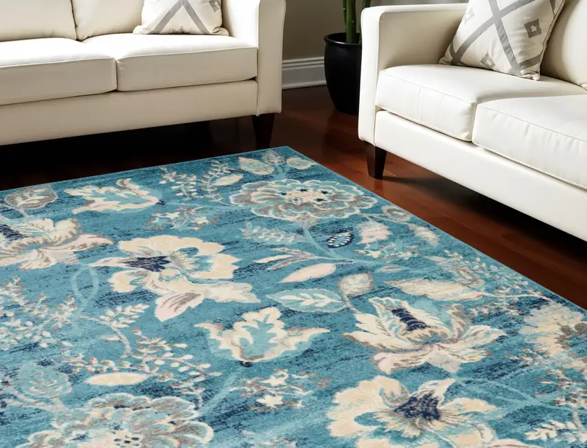Turquoise Cream and Navy Blue Floral Distressed Area Rug Photo 1