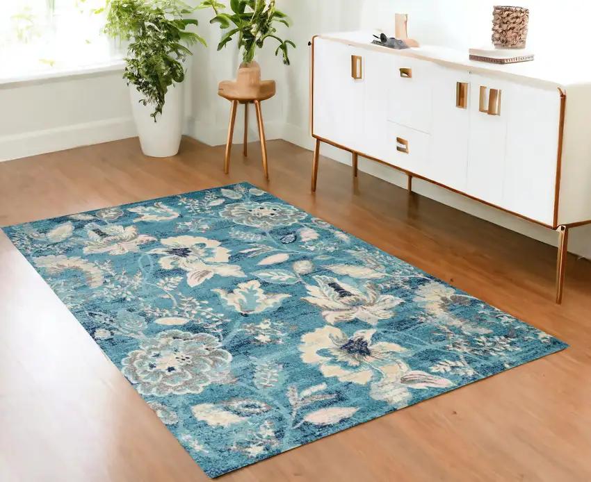 Turquoise Cream and Navy Blue Floral Distressed Area Rug Photo 1