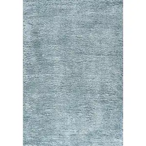 Photo of Turquoise Flatweave Area Rug