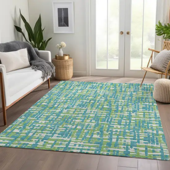 Turquoise Green And Ivory Abstract Geometric Washable Area Rug With UV Protection Photo 5