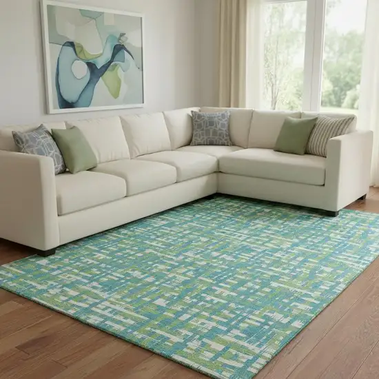 Turquoise Green And Ivory Abstract Geometric Washable Area Rug With UV Protection Photo 2
