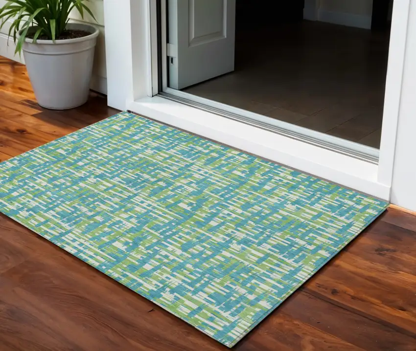 Turquoise Green And Ivory Abstract Washable Indoor Outdoor Area Rug Photo 1