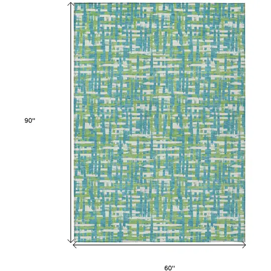 Turquoise Green And Ivory Abstract Washable Indoor Outdoor Area Rug Photo 7