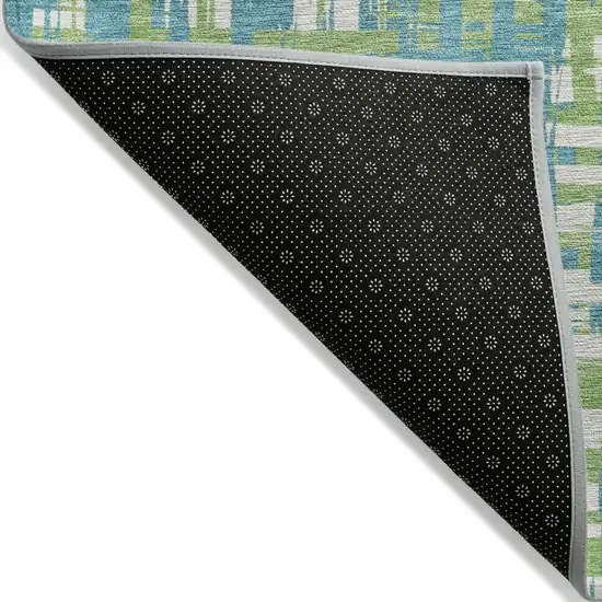 Turquoise Green And Ivory Abstract Washable Indoor Outdoor Area Rug Photo 4