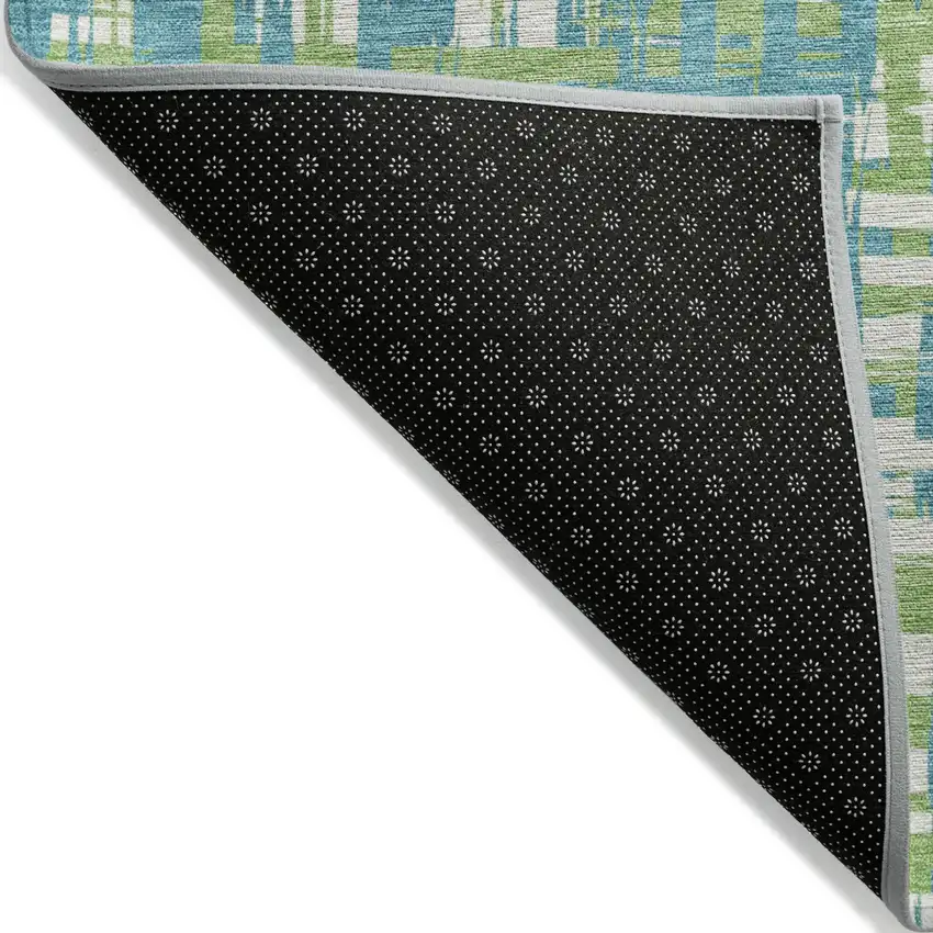 Turquoise Green And Ivory Abstract Washable Indoor Outdoor Area Rug Photo 4