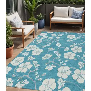 Photo of Turquoise Ivory And Gray Floral Washable Indoor Outdoor Area Rug