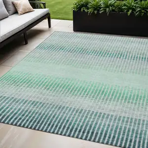 Photo of Turquoise Ivory And Gray Striped Washable Indoor Outdoor Area Rug