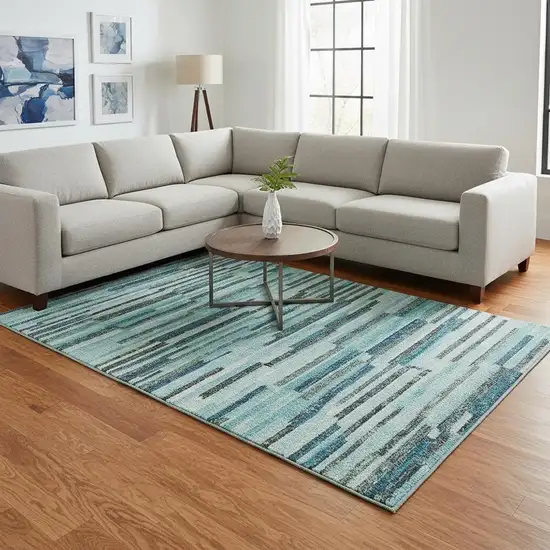 Turquoise Teal Blue And Gray Abstract Washable Area Rug With UV Protection Photo 1
