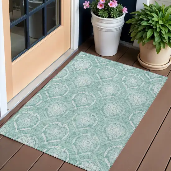 Turquoise Teal Blue And Ivory Medallion Washable Indoor Outdoor Area Rug Photo 1