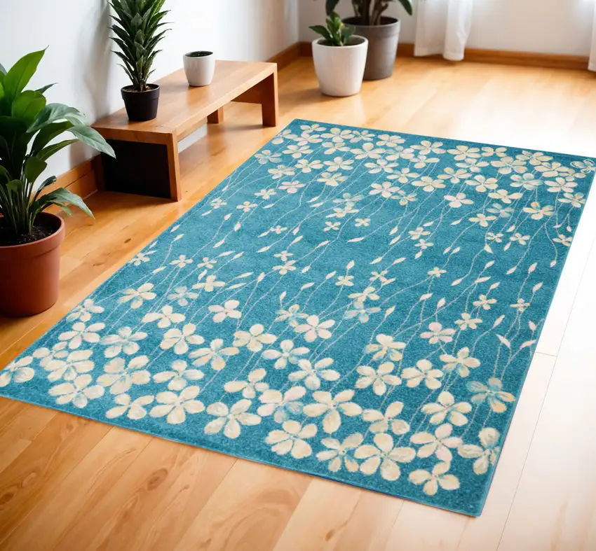 Turquoise and Cream Botanical Leaves Area Rug Photo 1
