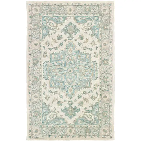 Turquoise and Cream Medallion Area Rug Photo 1