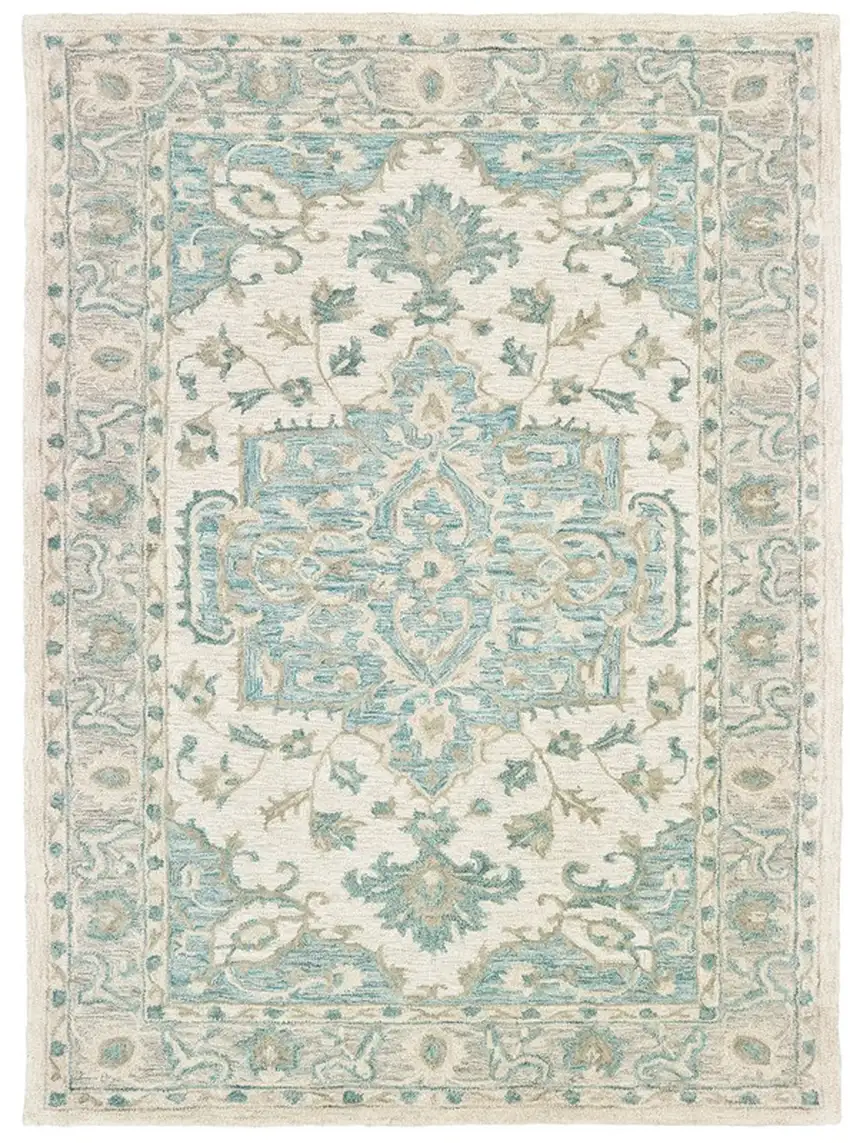 Turquoise and Cream Medallion Area Rug Photo 1