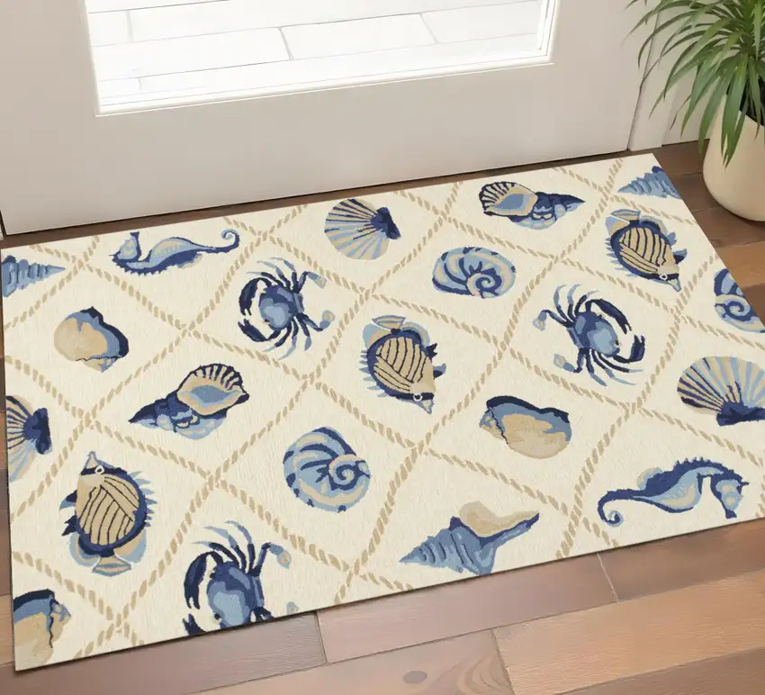Sand Beige And Blue Fish Hand Tufted Area Rug Photo 1