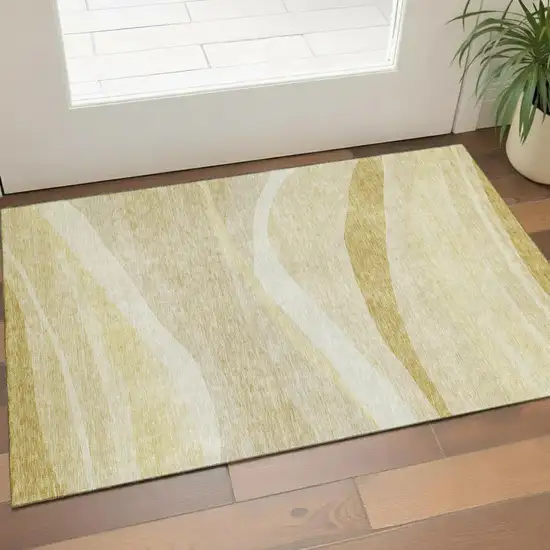 Wheat And Beige Abstract Washable Area Rug With UV Protection Photo 1