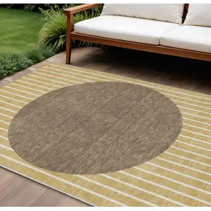 Photo of Wheat And Brown Striped Washable Indoor Outdoor Area Rug