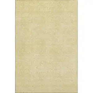 Photo of Wheat And Gold Geometric Washable Area Rug With UV Protection