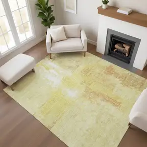 Photo of Wheat And Ivory Abstract Washable Area Rug With UV Protection