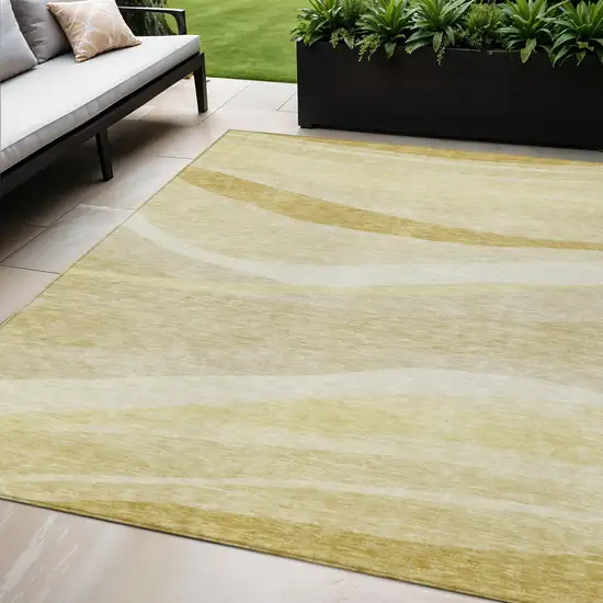 Wheat And Ivory Abstract Washable Indoor Outdoor Area Rug Photo 1