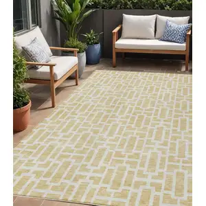 Photo of Wheat And Ivory Geometric Washable Indoor Outdoor Area Rug