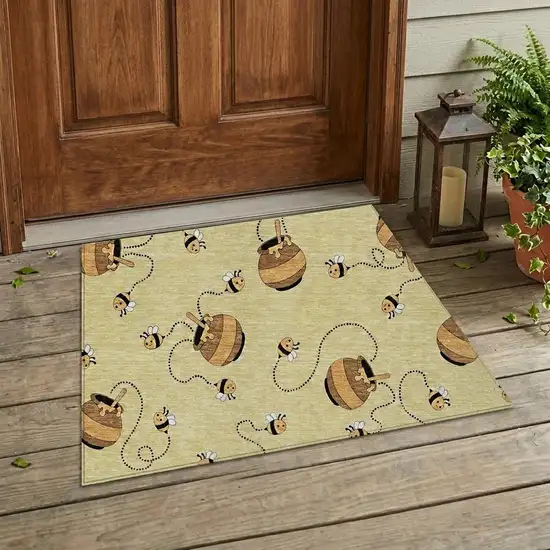 Wheat And Ivory Geometric Washable Indoor Outdoor Area Rug Photo 1